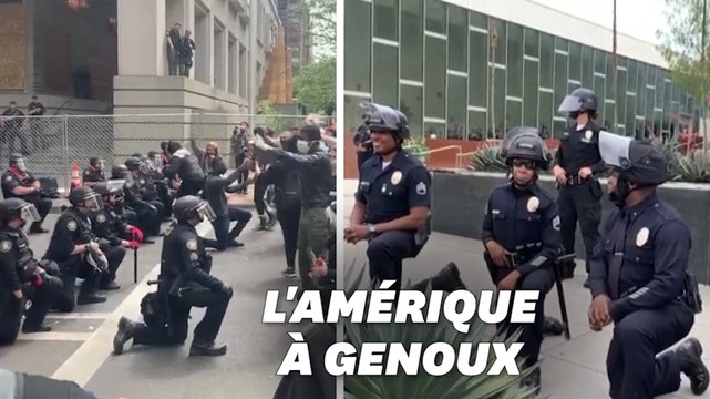 Genou à terre, certains policiers américains montrent leur soutien aux manifestants
