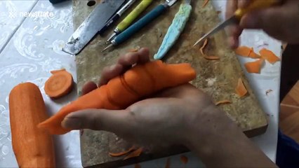 Vegetable carver from Vietnam creates realistic crayfish from carrot