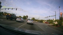 Red Light Runner Has Close Call With Traffic