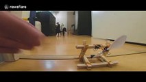 This is how to create a wooden catapult from leftover popsicle sticks
