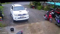 Moped Crashes into Garage