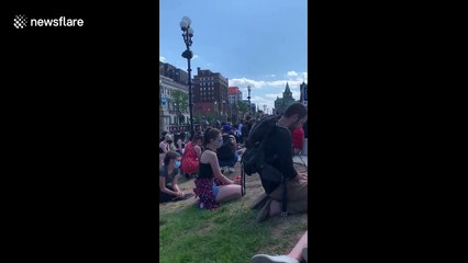 Download Video: 'You can hear a pin drop': Powerful moment Canadian protesters kneel in silence in Ottawa for George Floyd