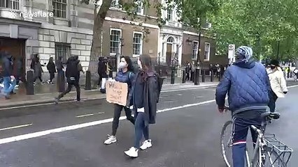 Touching moment police greet sax player during London BLM protest
