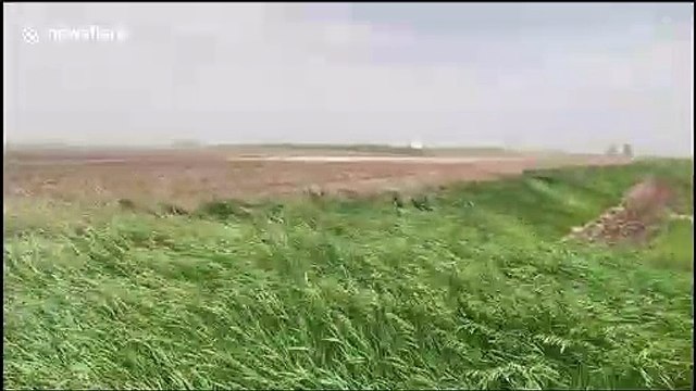 Watch as South Dakota storm chasers capture 70 mph winds and lightning as severe storms cross northern plains