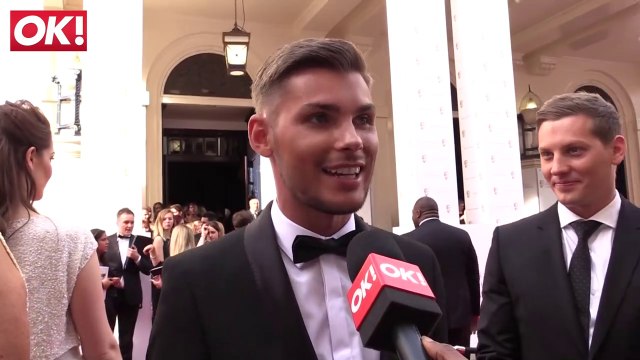 Kieron Richardson Red Carpet Interview with James Sutton in Background (2015 BAFTAs)