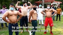 India's bodybuilders flex muscles, call for gyms to open
