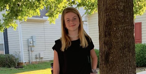 Elle prend sa fille en photo avant l'école et se rend compte q'un détail terrifiant