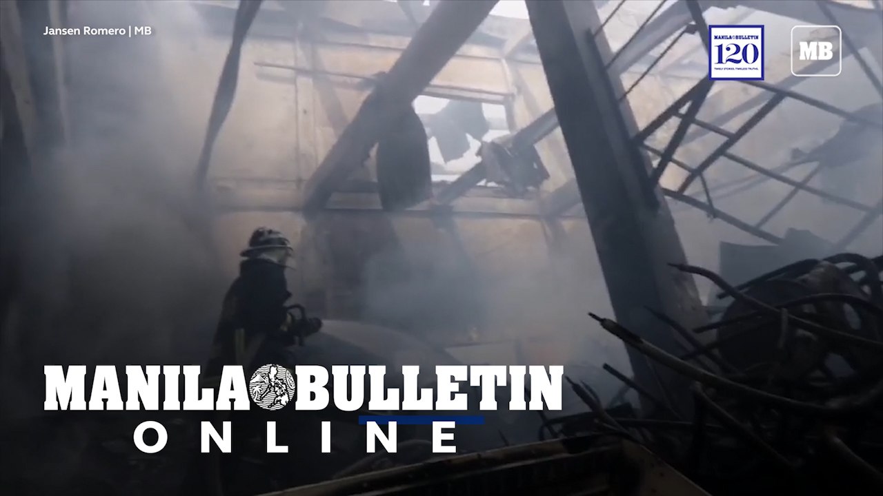 Fire fighters extinguishing the remaining fire...