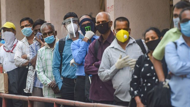 Mumbai: Bus services begin, social distancing tossed away