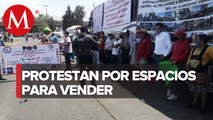 Comerciantes bloquean ambos sentidos de la avenida Eduardo Molina