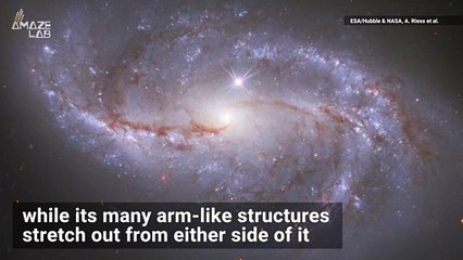 Hubble Spots Arm-Like Structures Sweeping Across Spiral Galaxy