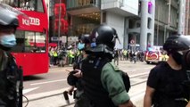 Police stop protesters marching on first anniversary of anti-extradition bill movement in Hong Kong