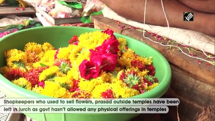 No flowers, no prasad inside temple premises make life miserable for shopkeepers