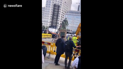 Workers remove statue of slave trader Robert Milligan in London