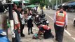 Motorcycle rider tries in vain to revive stray dog poisoned by humans