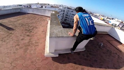 Parkour Athlete Does Rooftop Dips On a 40-meter ledge