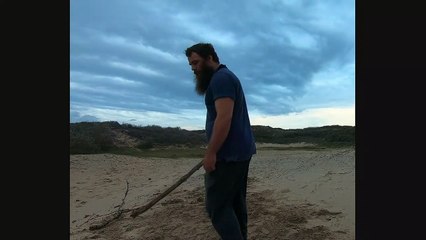 Throwing a long stick with a certain technique