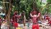 Demons wear Covid-19 face masks at Buddhist 'hell garden' in Thailand