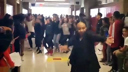 Teacher teaches students to dance Thriller