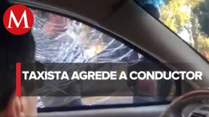 Taxista de CdMx rompe cristal de conductor; Semovi analiza cancelarle licencia