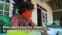 Indonesian teachers take on perilous journey as pupils lack access to online learning