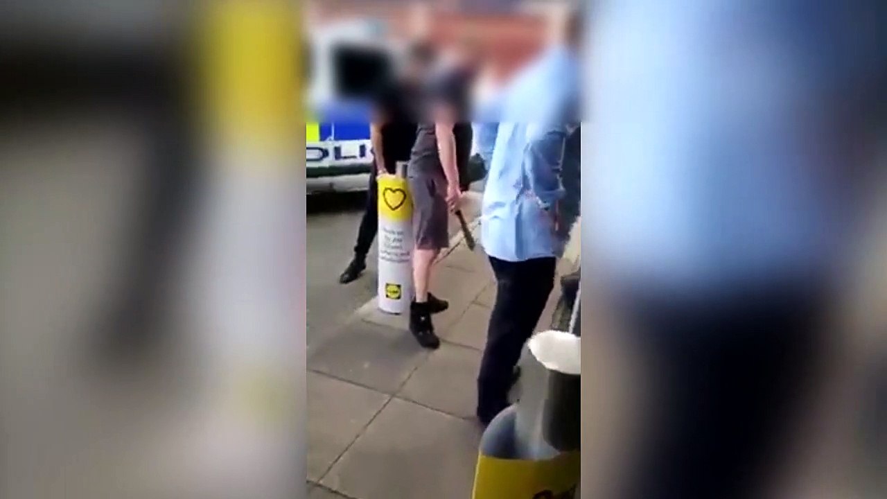 Man with 'machete' type weapon arrested