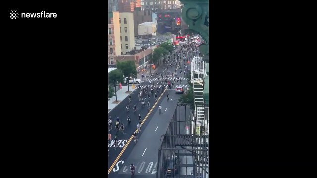 Thousands of cyclists take over New York City streets in solidarity protest ride