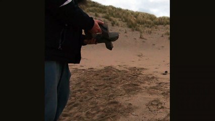 Sideways throwing a big stone with the right hand 4