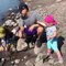 Little Girl Accidentally Hits Dad Face While Throwing Rock into Water