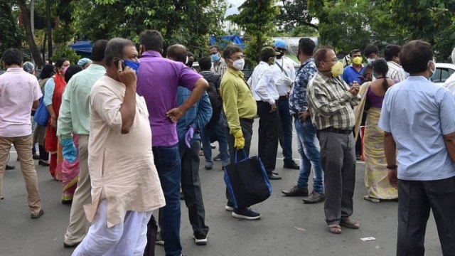Karnataka MP inaugurates bridge while crowd flouts social distancing norms