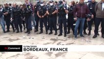Angry French police throw handcuffs away in protest at claims of racism