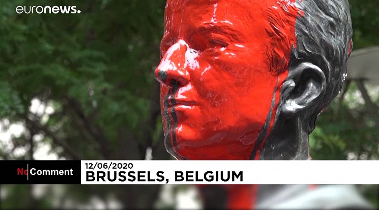 A statue of former Belgian King Baudouin defaced with red paint