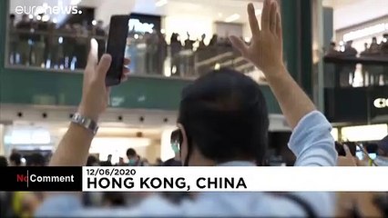Hong Kongers sing protest anthem one year after major clashes