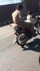 Toddler kid riding motorcycle