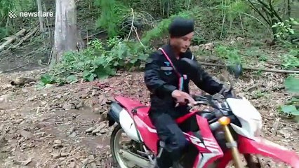 Village battered by rocks from mountain flash flood in northern Thailand