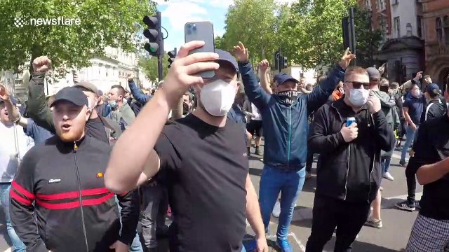 Thousand of far-right protesters descend on Whitehall to protect symbols of British history