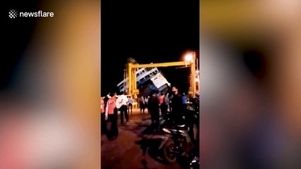 Passengers evacuated after ferry capsizes in Indonesia