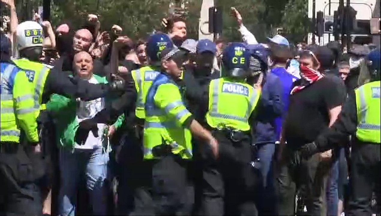 More than 100 arrested after far-right activists clash with police in London