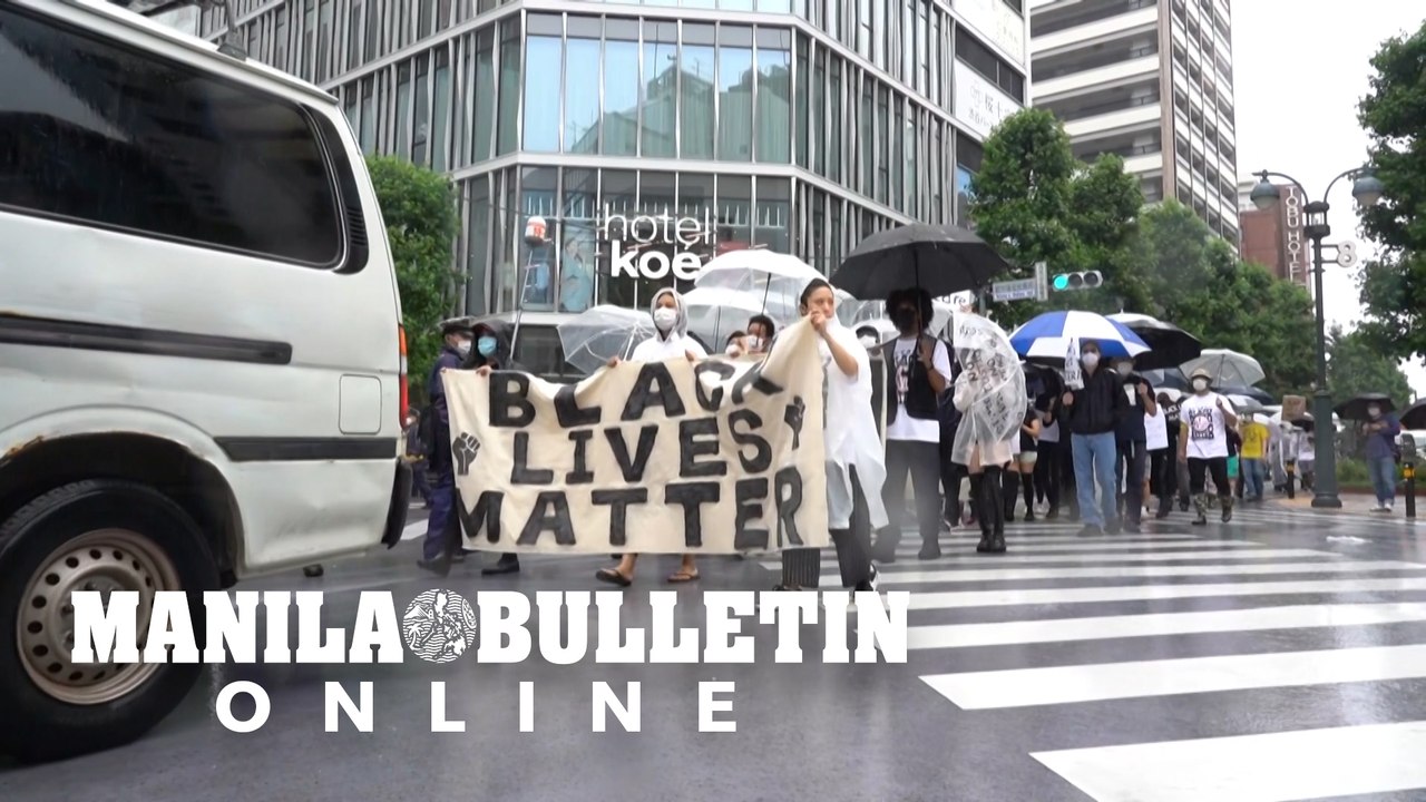 Black Lives Matter supporters brave the rain in Tokyo