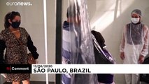 Brazilian nursing home residents and loved ones use plastic 'hug curtain' amid pandemic