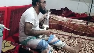 old bangali playing gitor and alsosinging