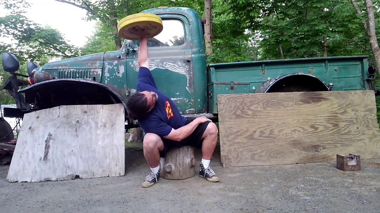 Seated Bent Press Stacked IVANKO 15Kg Plates