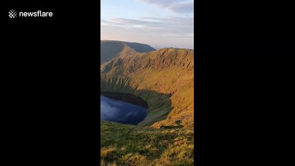 Picturesque footage shows blanket of clouds flow through Lake District valleys