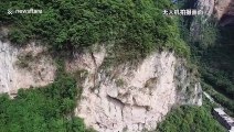 Chinese firefighters rescue man trapped on 100-metre-high cliff