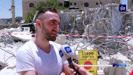 آليات الاحتلال تهدم عدداً من الشقق السكنية والمحال التجارية في مخيم شعفاط