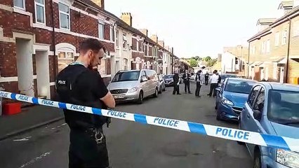 Police tape off Russell Street