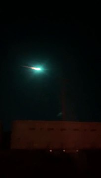 Large Meteor Racing Through Sky