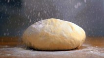 Avraham Chaim Kerendian-a-chef-covering-dough-with-flour
