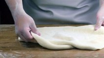 Avraham Chaim Kerendian-a-chef-preparing-pizza-dough