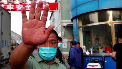 Beijing district on alert after new virus cluster
